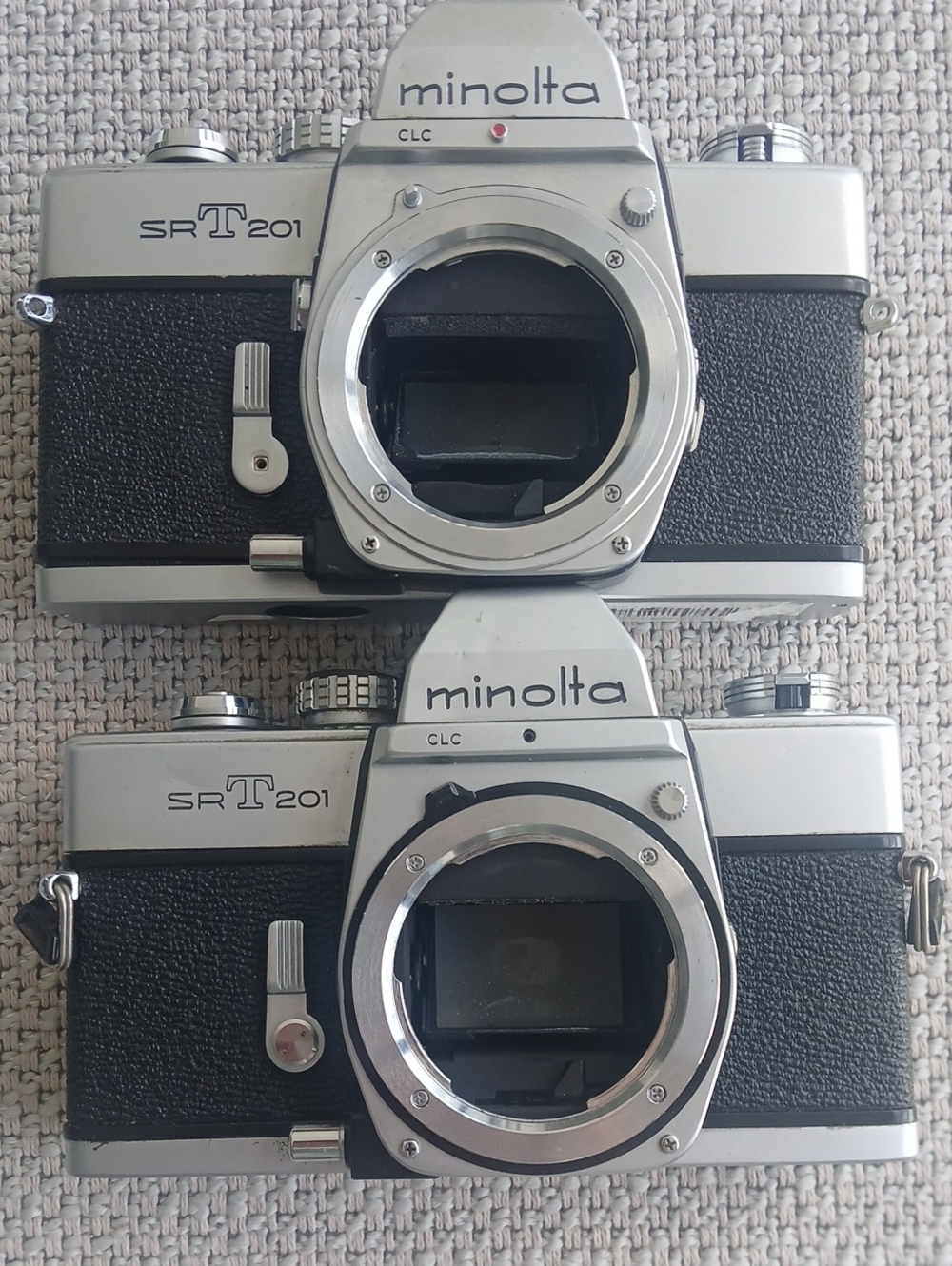 2 Untested Minolta SR-T201 Silver & Black Classic 35mm SLR Camera Body (Pair)